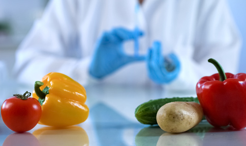 Vegetables on a lab table representing food safety.